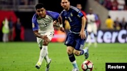 کپتان تیم فوتبال ارژنتاین که نقش عمدۀ را در شکست ایالات متحده بازی کرد.