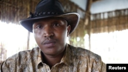 FILE - Indicted war criminal Bosco Ntaganda poses for a photograph during an interview in Goma, Democratic Republic of Congo, October 5, 2010.
