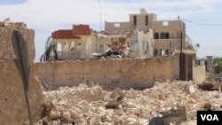 The scene of Monday's suicide bombing in a Mogadishu neighborhood in Somalia, Jan. 2, 2017. (Photo - Abdulkadir Mohamed Abdulle for VOA's Somali Service)