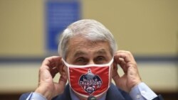 Dr. Anthony Fauci, director of the National Institute for Allergy and Infectious Diseases, adjusts his face mask during a House Subcommittee on the Coronavirus crisis hearing, Friday, July 31, 2020 on Capitol Hill in Washington. (Kevin Dietsch/Pool via AP