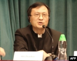 新民周刊主笔胡展奋