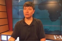 资料照：周锋锁接受美国之音采访