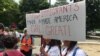 Protesters gather in Washington, D.C., on May Day to stand against President Donald Trump's policies on immigration. (A. Barros/VOA)