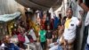 FILE - Residents live in crowded conditions in the Sayidka camp for internally displaced people in Mogadishu, Somalia, March 26, 2020. The country has only a handful of coronavirus cases so far, but camp residents feel vulnerable.