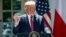 President Donald Trump answers reporter's question during a press conference at the White House in Washington. 