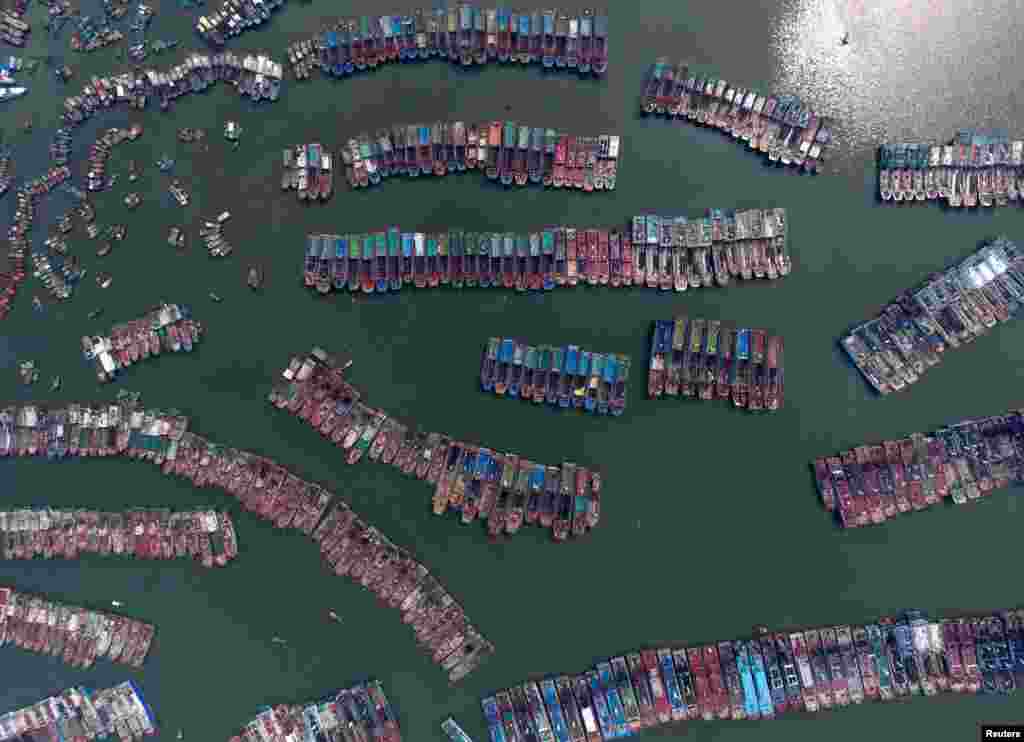 Fishing boats are parked in a port as Typhoon Nida approaches Guangzhou, Guangdong Province, China, Aug. 1, 2016.
