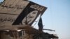 After 100 days of fighting, Iraqi forces took all of eastern Mosul back from IS militants and are now planning to begin fighting in the western part of the city in the coming days. This IS sign, like many, was destroyed when Iraqi forces took over, in Mosul, Iraq, Feb. 6, 2017. (H. Murdock/VOA)
