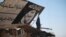 After 100 days of fighting, Iraqi forces took all of eastern Mosul back from IS militants and are now planning to begin fighting in the western part of the city in the coming days. This IS sign, like many, was destroyed when Iraqi forces took over, in Mosul, Iraq, Feb. 6, 2017. (H. Murdock/VOA)