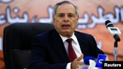 Libyan Defense Minister Mohammed al-Barghati is seen in a May 11, 2013, file photo.