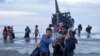 Rohingya refugees disembark at Ulee Madon, North Aceh, Indonesia, on Nov. 16, 2023. Some 250 Rohingya Muslims are afloat off the coast of Indonesia after two attempts to land were rejected by local residents.