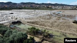 Foto yang diambil dengan drone menunjukkan wilayah di Kota Licata, Italia, terendam banjir pada 20 Oktober 2024. (Foto: Reuters/Danilo Arnone)