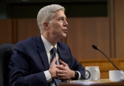 FILE - Supreme Court Justice nominee Neil Gorsuch testifies on Capitol Hill in Washington during his confirmation hearing before the Senate Judiciary Committee, March 22, 2017.
