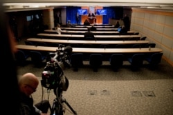 FILE - U.S. Secretary of State Mike Pompeo speaks at a news conference, which under coronavirus restrictions has only a handful of reporters and one pool camera in the room, at the State Department, in Washington, April 29, 2020.