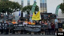 星期六(10月26日)下午，洛杉矶的异议人士在中国领事馆门前举行抗议活动，谴责中国河北省邯郸市魏县警方非法抓捕和拘禁王宇、江天勇等人权律师。