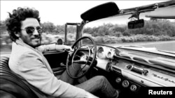 Bruce Springsteen is shown driving his 1957 Chevrolet Bel Air Convertible referenced in his iconic song "Born to Run" in this undated photo, provided Dec. 15, 2016. (Courtesy Eric Meola/Handout via REUTERS)