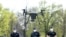 Police officers prepare a drone to find residents who fail to comply with the stay-at-home order implemented due to the coronavirus pandemic in Szolnok, Hungary, April 13, 2020.