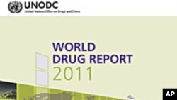 Honor guards stand next to the coffins of Georgian servicemen who were recently killed in Afghanistan, in Tbilisi, Georgia. Three Georgian soldiers serving with the NATO-led force in Afghanistan were killed in an insurgent attack on a base in Helmand province.