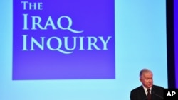 前英国政府官员约翰.齐尔科特7月6日在伦敦公布伊拉克战争调查报告