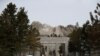 A woman walks at the Mount Rushmore National Memorial as the spread of the coronavirus disease (COVID-19) continues in South Dakota.