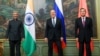 ICAPTION CORRECTS DATE In this photo released by the Russian Foreign Ministry Press Service, India's Foreign Minister S. Jaishankar, left, Russia's Foreign Minister Sergey Lavrov, and China's Foreign Minister Wang Yi, pose for a photo on the…
