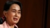 The government says on Sept. 29, 2016, Myanmar leader Aung San Suu Kyi has returned to the country's capital after a brief illness following her visit to the United States.