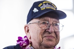 FILE - U.S.S. Arizona survivor Lauren Bruner during a memorial service for the 73rd anniversary of the attack on the U.S. naval base at Pearl harbor, Dec. 7, 2014, in Pearl Harbor, Hawaii.