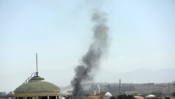 Smoke rises next to the U.S. Embassy in Kabul, Afghanistan, Aug. 15, 2021.