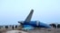A view shows the wreckage of a passenger plane at the crash site near Aktau