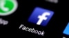 FILE: The Facebook icon is seen on a phone screen, Aug. 3, 2017. 