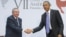 U.S. President Barack Obama and Cuban President Raul Castro meet for an informal talk on the sidelines of the Summit of the Americas in Panama City, April 11, 2015. 