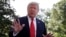 FILE - President Donald Trump talks with reporters before departing on Marine One for the Air Force Academy graduation ceremony, May 30, 2019, in Washington.