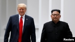 美国总统特朗普与朝鲜领导人金正恩在新加坡会晤。(2018年6月12日)