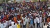 Protesters march near the scene of Saturday's massive truck bomb attack in Mogadishu, Somalia, Oct. 18, 2017. 
