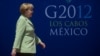 German chancellor Angela Merkel arrives at the G20 Summit of Heads of State and Government in Los Cabos, Baja California, Mexico on June 18, 2012.