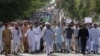  Protesters shout slogans as they march towards the U.S. Embassy during an anti-America rally in Islamabad, September 21, 2012..