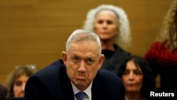 Benny Gantz, leader of the Blue and White party, reacts during a committee meeting at the Knesset, Israel's parliament, in Jerusalem, Dec. 11, 2019. 