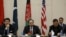 Afghanistan's Foreign Minister Salahuddin Rabbani, center, speaks during a one-day meeting with Pakistan, U.S. and Chinese delegations in Kabul, Jan. 18, 2016. The talks are aimed at ending the country's 15 years of war with the Taliban.