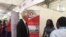 L’ambassadeur des États-Unis au Cameroun Paul Henry Balerin, visite les stands des entreprises américaines à Yaoundé, au Cameroun, le 21 février 2019. (VOA/Emmanuel Jules Ntap)
