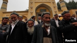 资料照片：新疆喀什的维吾尔人（2019年5月9日）