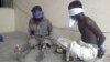 Suspected members of the radical Islamist sect Boko Haram are detained in Bukavu Barracks in Kano state, Nigeria, March 21, 2012. 