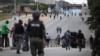 FILE - Nigerian police officers patrol in the streets of Abuja during clashes with members of the Shi'ite Islamic Movement of Nigeria, July 22, 2019. 