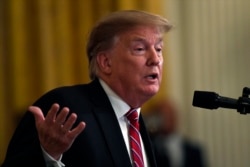 FILE - President Donald Trump speaks at the 2019 Prison Reform Summit and First Step Act Celebration in the East Room of the White House in Washington, April 1, 2019.