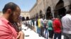 Muslims stand in lines at Friday’s prayers at Al-Azhar Mosque. Since the clashes of 2013, the Egyptian government has put together a plan they say prevents hate speech in mosques. Each week, the Al-Azhar mosque presents Egyptian clerics with a topic or t