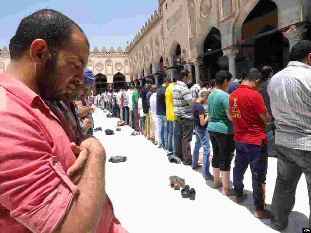 Muslims stand in lines at Friday’s prayers at Al-Azhar Mosque. Since the clashes of 2013, the Egyptian government has put together a plan they say prevents hate speech in mosques. Each week, the Al-Azhar mosque presents Egyptian clerics with a topic or t
