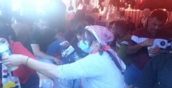 Najlaa al-Jubory, 42, an Iraqi mother of two, has been on the streets of Baghdad nearly every day for more than a month. (Photo courtesy of protesters)