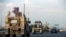 A convoy of U.S. vehicles is seen after withdrawing from northern Syria, in Erbil, Iraq, Oct. 21, 2019. 