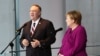 U.S. Secretary of State Mike Pompeo (L) and German Chancellor Angela Merkel hold a joint news conference in Berlin, Germany, Nov. 8, 2019.