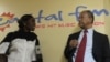 Capital FM owner Alaudin Osman and sub-editor Chikondi Juma in Blantyre, Malawi