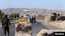  town, south of Irbil, Sept. 10, 2014. 