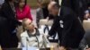 United States Secretary of State Hillary Clinton speaks to French Foreign Minister Laurent Fabius before a meeting of the Security Council during the 67th United Nations General Assembly, at U.N. headquarters in New York, September 26, 2012. 